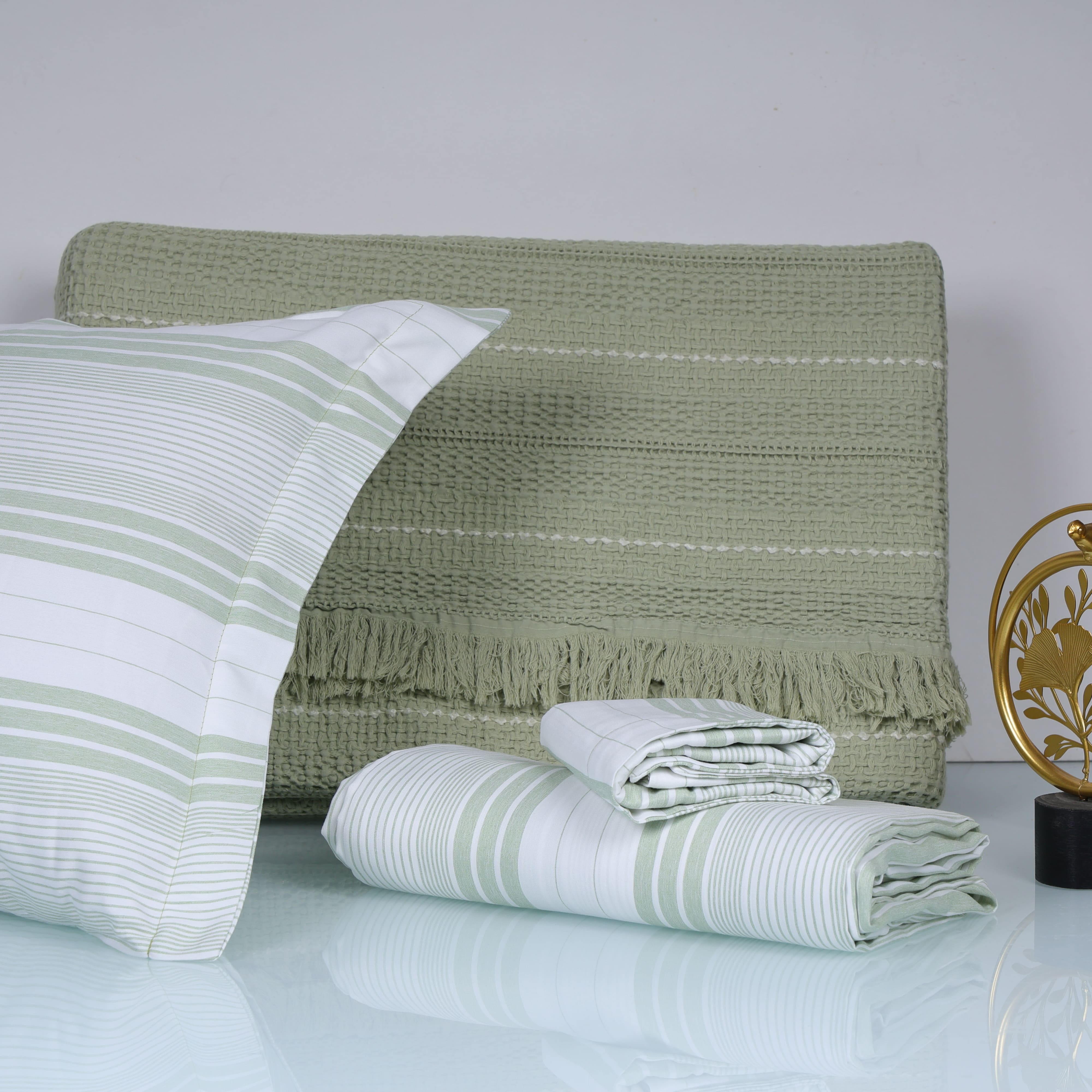 Green textured bedspread set with white stripes